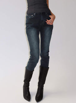 back view of model wearing Princess Polly Illyssa Mid Rise Skinny Jeans Washed Charcoal Mid Rise Jeans 