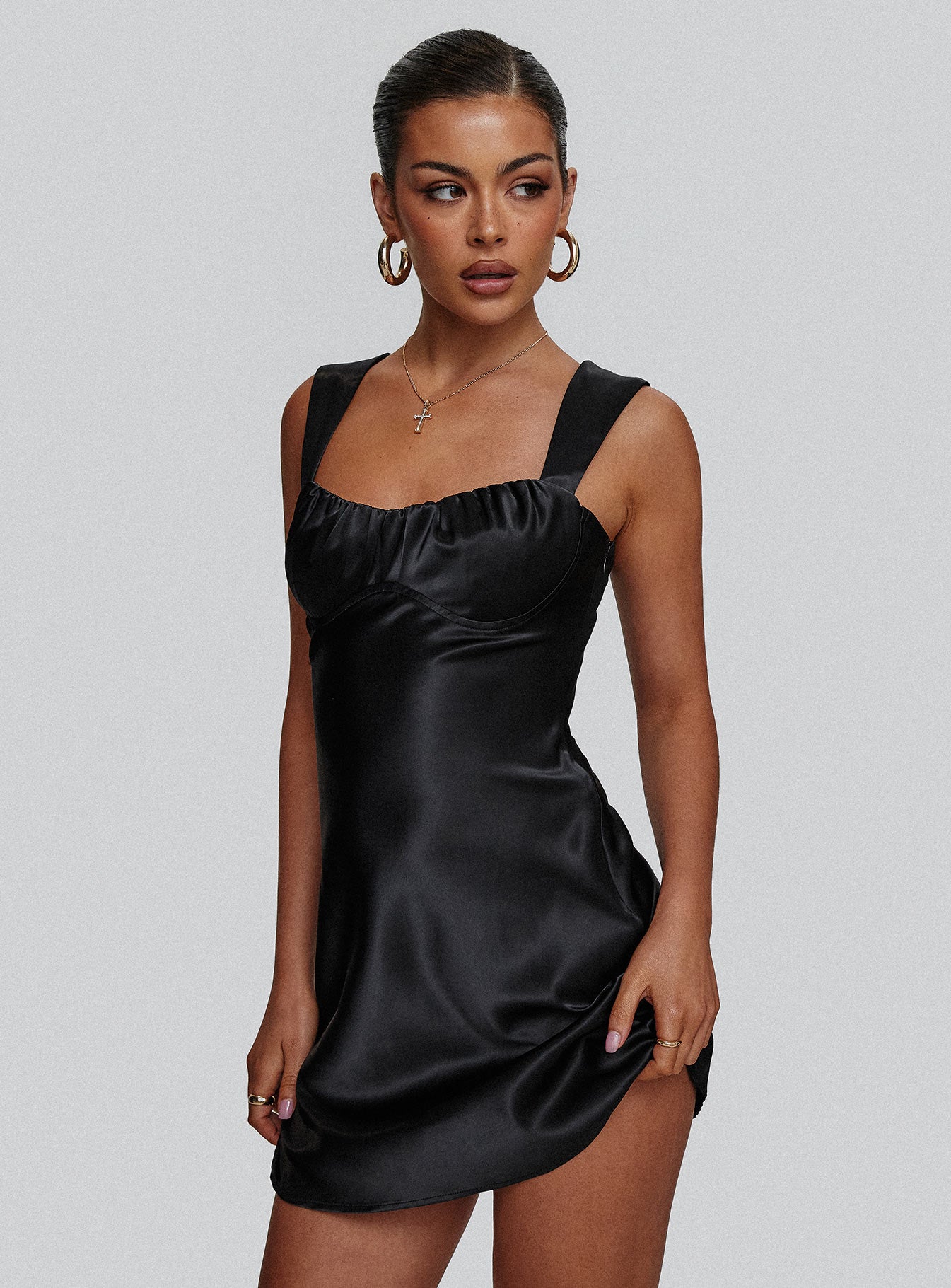 side view of model wearing Princess Polly Tremont Mini Dress Black Sweetheart Neckline 
