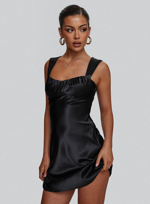 side view of model wearing Princess Polly Tremont Mini Dress Black Sweetheart Neckline 