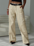 side view of model wearing Princess Polly Chicker Mid Rise Pants Beige Low Rise Pants 