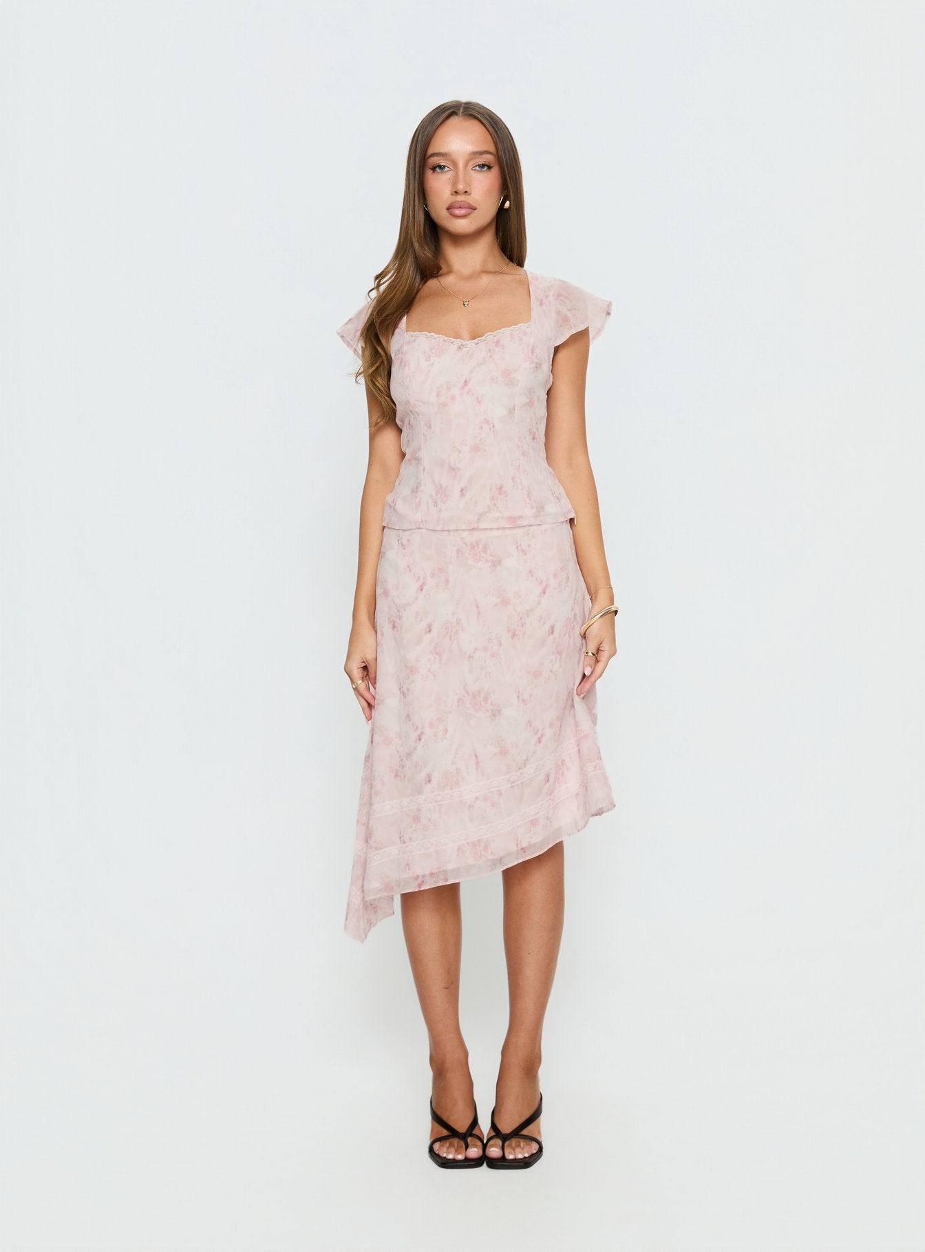   front view of model wearing Princess Polly Avaline Asymmetrical Midi Skirt Pink 