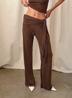 side view of model wearing Princess Polly Katiana Wrap Jersey Pants Brown Mid Rise Pants 