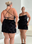 back view of model wearing Princess Polly Celena Mini Dress Burn Out Black Curve Cowl Neck 