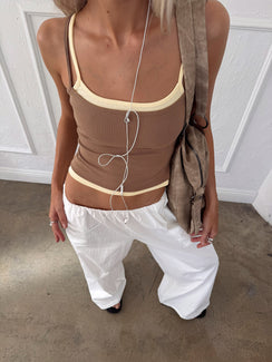 front view of model wearing Princess Polly Lunea Concealed Waistband Pants White Low Rise Pants 