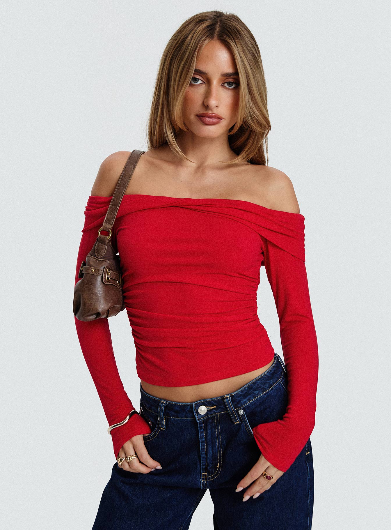 front view of model wearing Princess Polly Sonnett Off Shoulder Twist Long Sleeve Top Red Full Sleeves straight 
