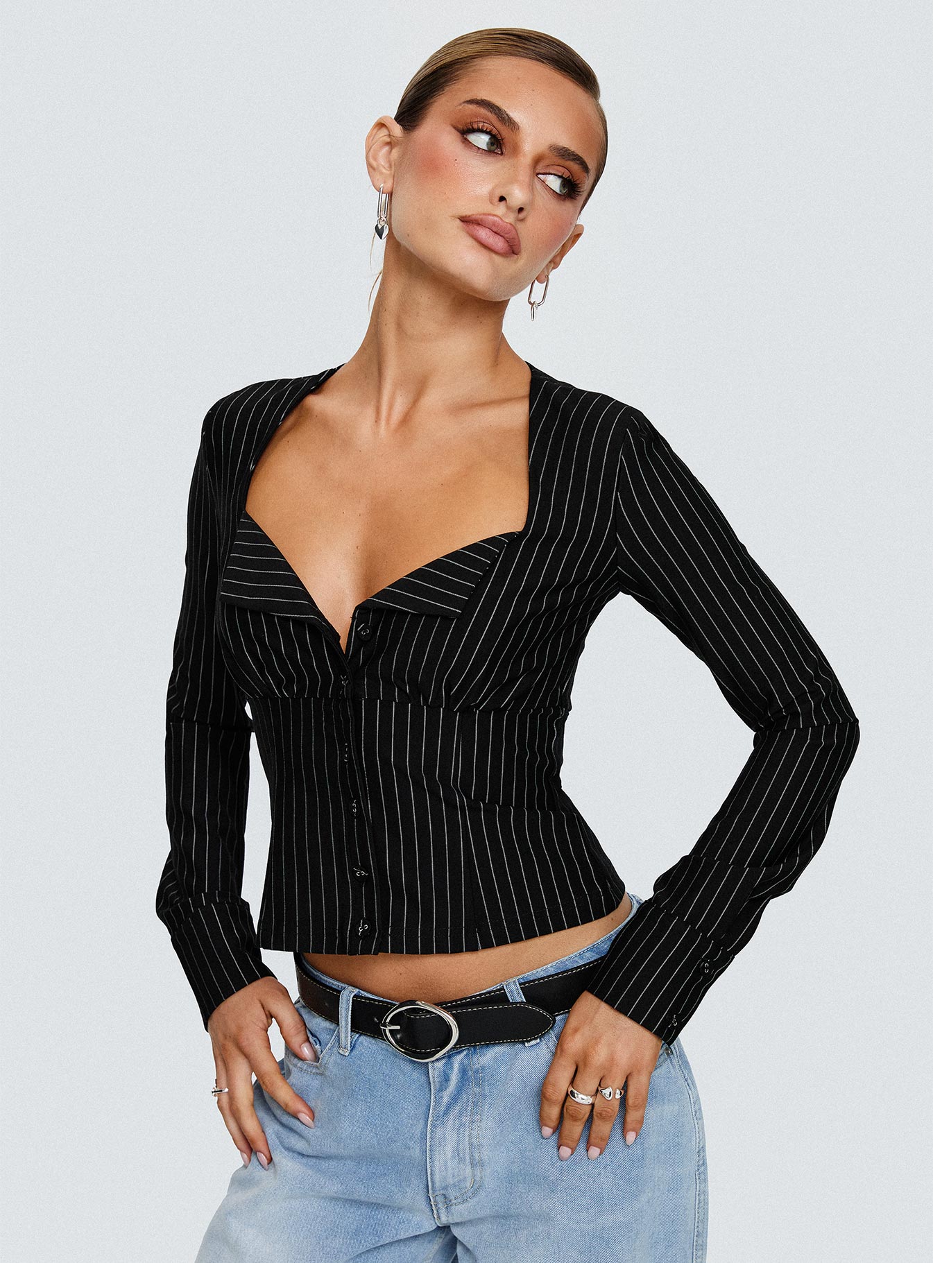 front view of model wearing Princess Polly Set For Life Foldover Detail Long Sleeve Top Black / White Pinstripe Full Sleeves V-Neck 