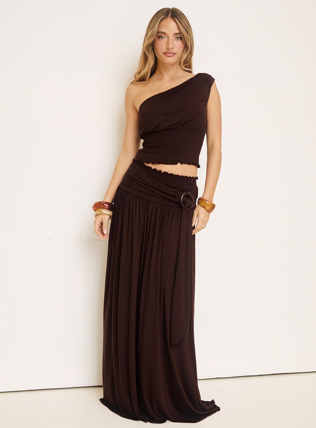   front view of model wearing Princess Polly Full Orbit Shirred Maxi Skirt Chocolate Brown Maxi Skirts 