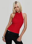 front view of model wearing Princess Polly Dafina Halter Top Red Sleeveless Cowl 