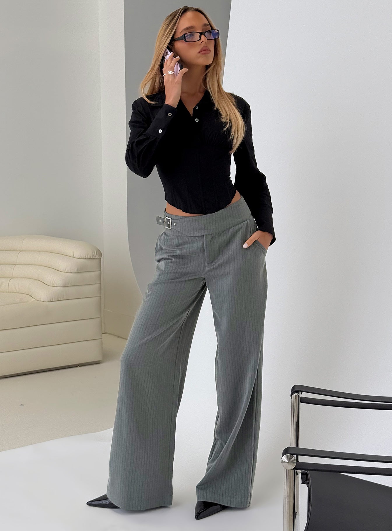 front view of model wearing Princess Polly Jinny Relaxed Buckle Tailored Pants Grey Pinstripe Low Rise Pants 