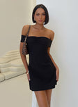 back view of model wearing Princess Polly Lanes Off The Shoulder Mini Dress Black Straight Neck 