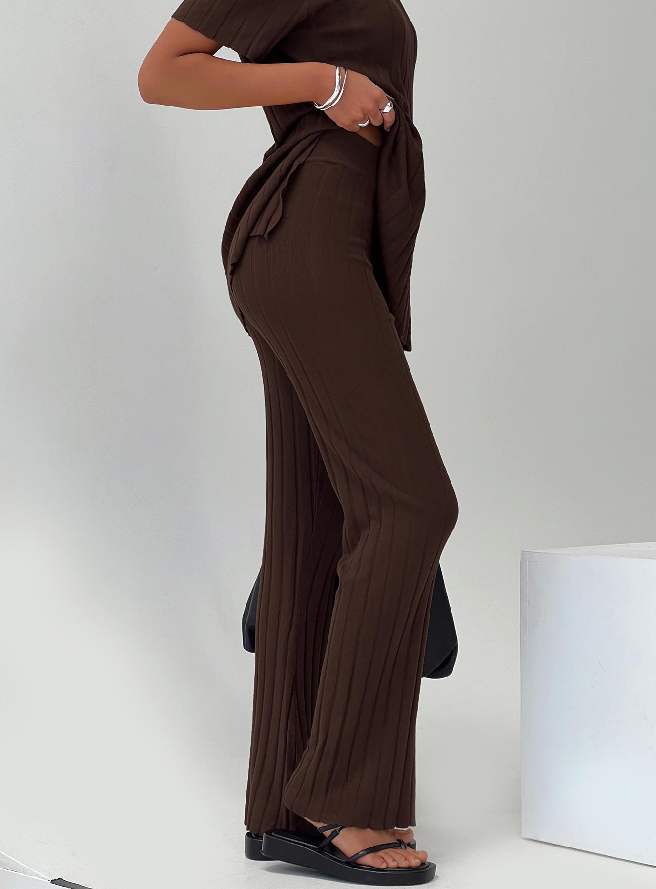 side view of model wearing Princess Polly Palomia Ribbed Pants Chocolate High Waisted Pants 