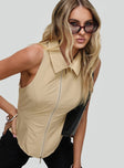 side view of model wearing Princess Polly Bedford Top Beige Sleeveless High Neck 