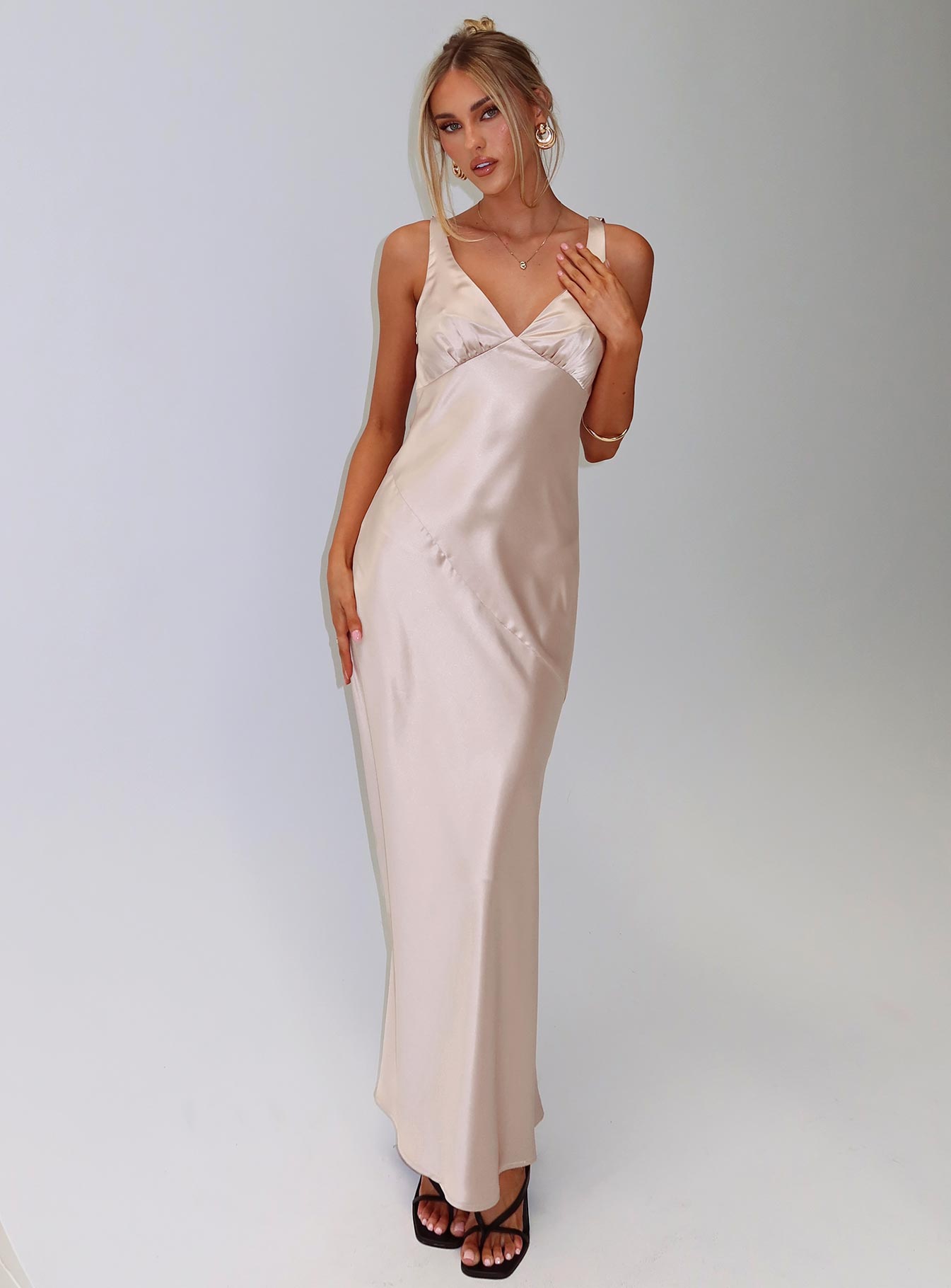 front view of model wearing Princess Polly Northern Star Maxi Dress Champagne V-Neck 