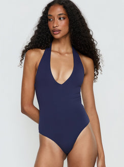 front view of model wearing Princess Polly Someone New Halter Bodysuit Navy Sleeveless 