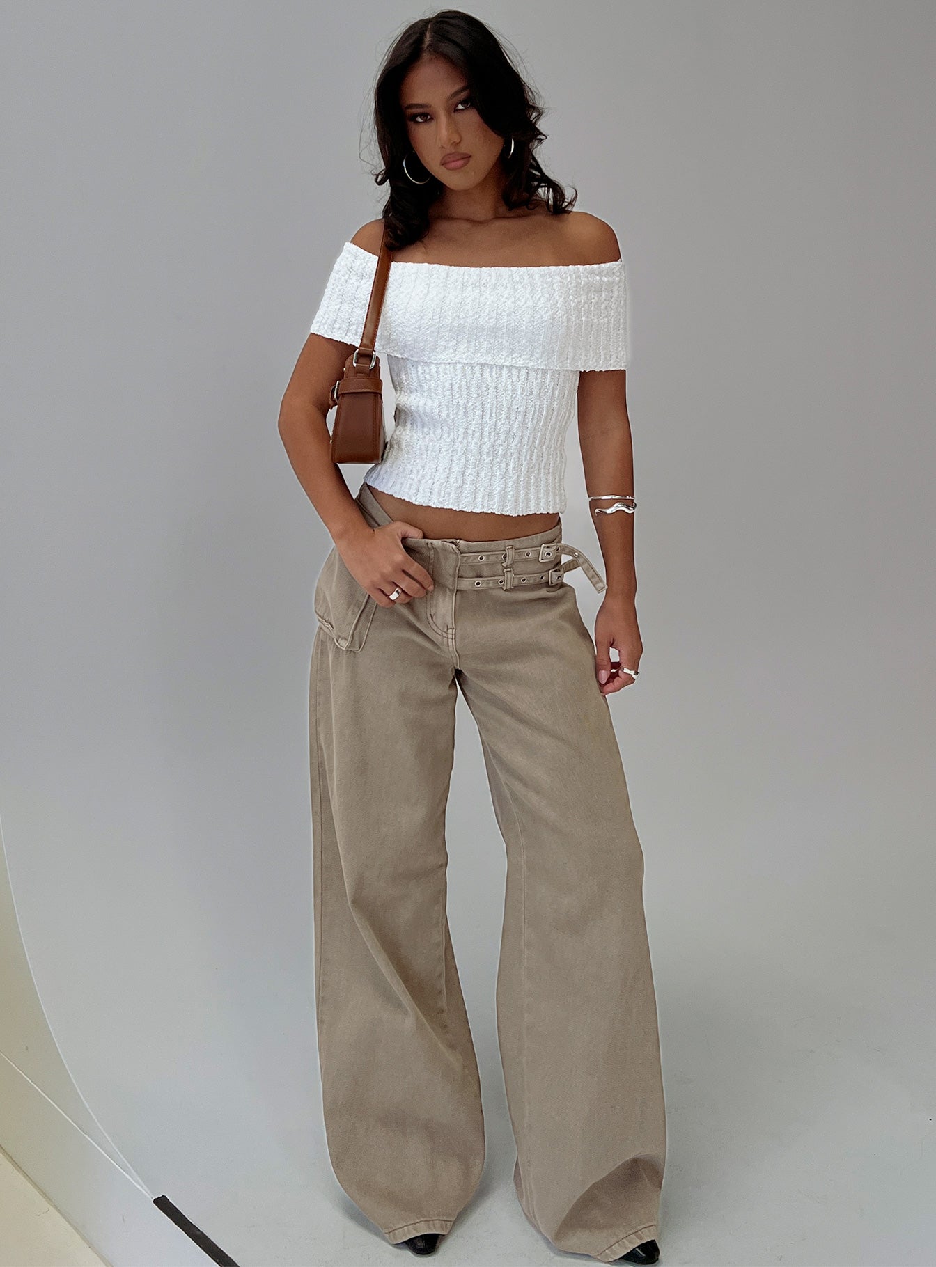 side view of model wearing Princess Polly Murmur Off Shoulder Top White Short Sleeves straight 