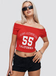 front view of model wearing Princess Polly Serendipia Off The Shoulder Graphic Top Red Short Sleeves straight 