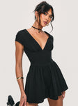 Black Playsuit V neckline, invisible zip fastening at back, pleats at waist, cap sleeve