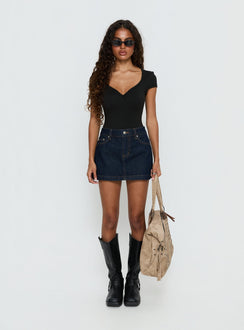 side view of model wearing Princess Polly Laretta Button Up Bodysuit Black Short Sleeve 