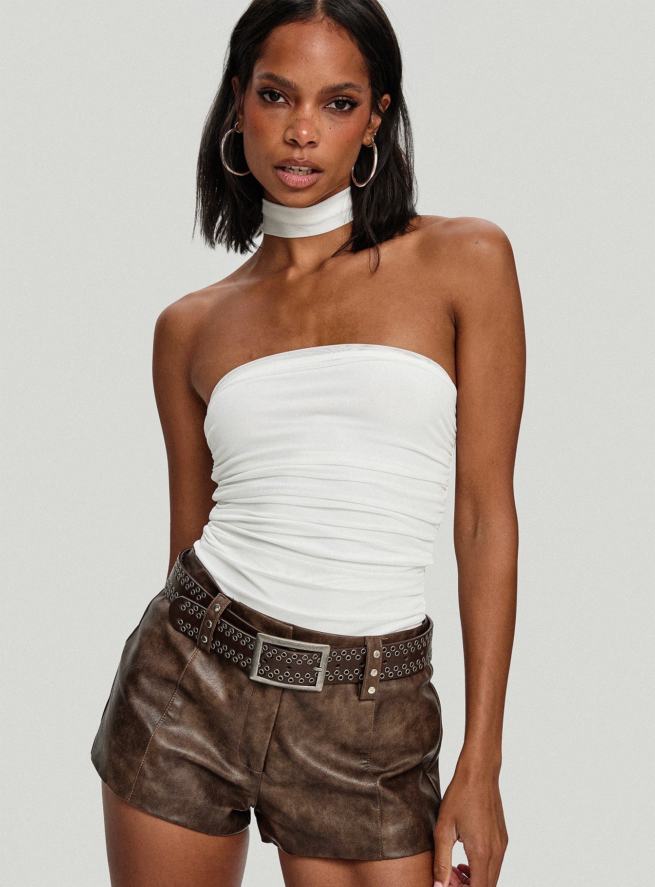 side view of model wearing Princess Polly Sorelle Scarf Bodysuit White Sleeveless 