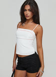 side view of model wearing Princess Polly Thatcher Top White Sleeveless straight 