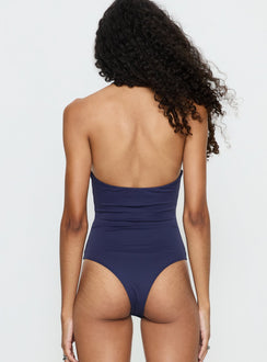 back view of model wearing Princess Polly Someone New Halter Bodysuit Navy Sleeveless 