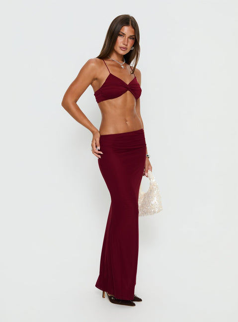   side view of model wearing Princess Polly Delores Ruched Maxi Skirt Red Maxi Skirts 