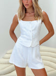 Two-piece linen set Vest top, fixed shoulder straps, square neckline, button fastening down front, faux front pockets High-rise shorts, invisible zip fastening at back Non-stretch material, fully lined