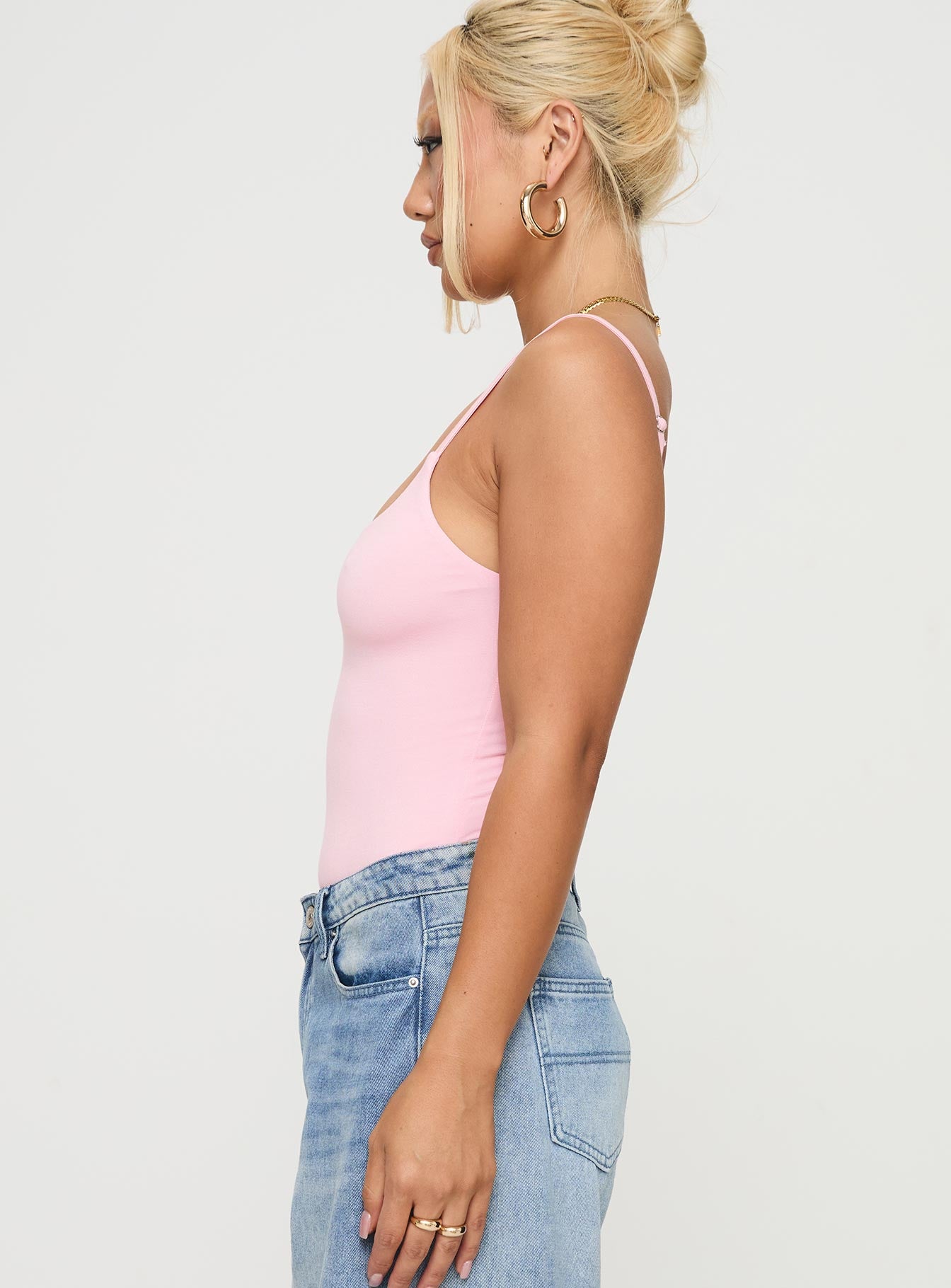 side view of model wearing Princess Polly Sweet Life Bodysuit Pink Sleeveless 