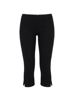 side view of model wearing Princess Polly Baseline Rib Capri Pants Black Tall Mid Rise Pants 