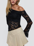 side view of model wearing Princess Polly Soffie Off Shoulder Lace Long Sleeve Top Black Full Sleeves Asymmetric Neckline 