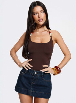   front view of model wearing Princess Polly Warna Low Rise Denim Mini Skirt Dark Wash Mini Skirts 