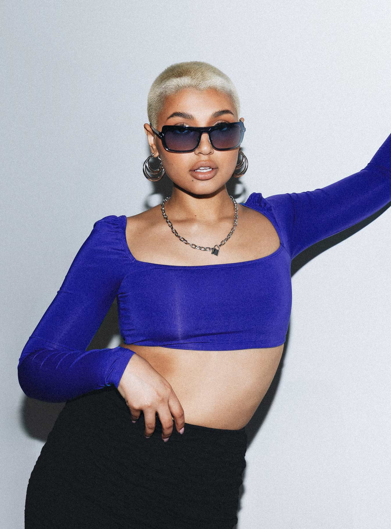 front view of model wearing Princess Polly Rogers Long Sleeve Top Blue Full Sleeves Square Neck 