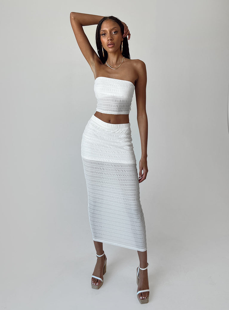 Matching set Sheer mesh material  Strapless top  Inner silicone strip at bust  High waisted midi skirt  Elasticated waistband 