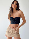 Strapless top 70% cotton 30% linen  Inner silicone strip at bust  Twisted bust  Cut out detail  Shirred back 