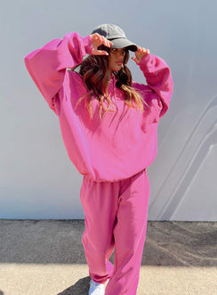 side view of model wearing Princess Polly Ritu Oversized Hoodie Pink 