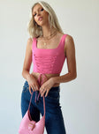 back view of model wearing Princess Polly Holland Top Pink Sleeveless Square Neck 