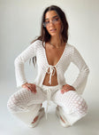 White long sleeve top Crochet material  Wide neckline  Tie fastening at bust Good stretch 