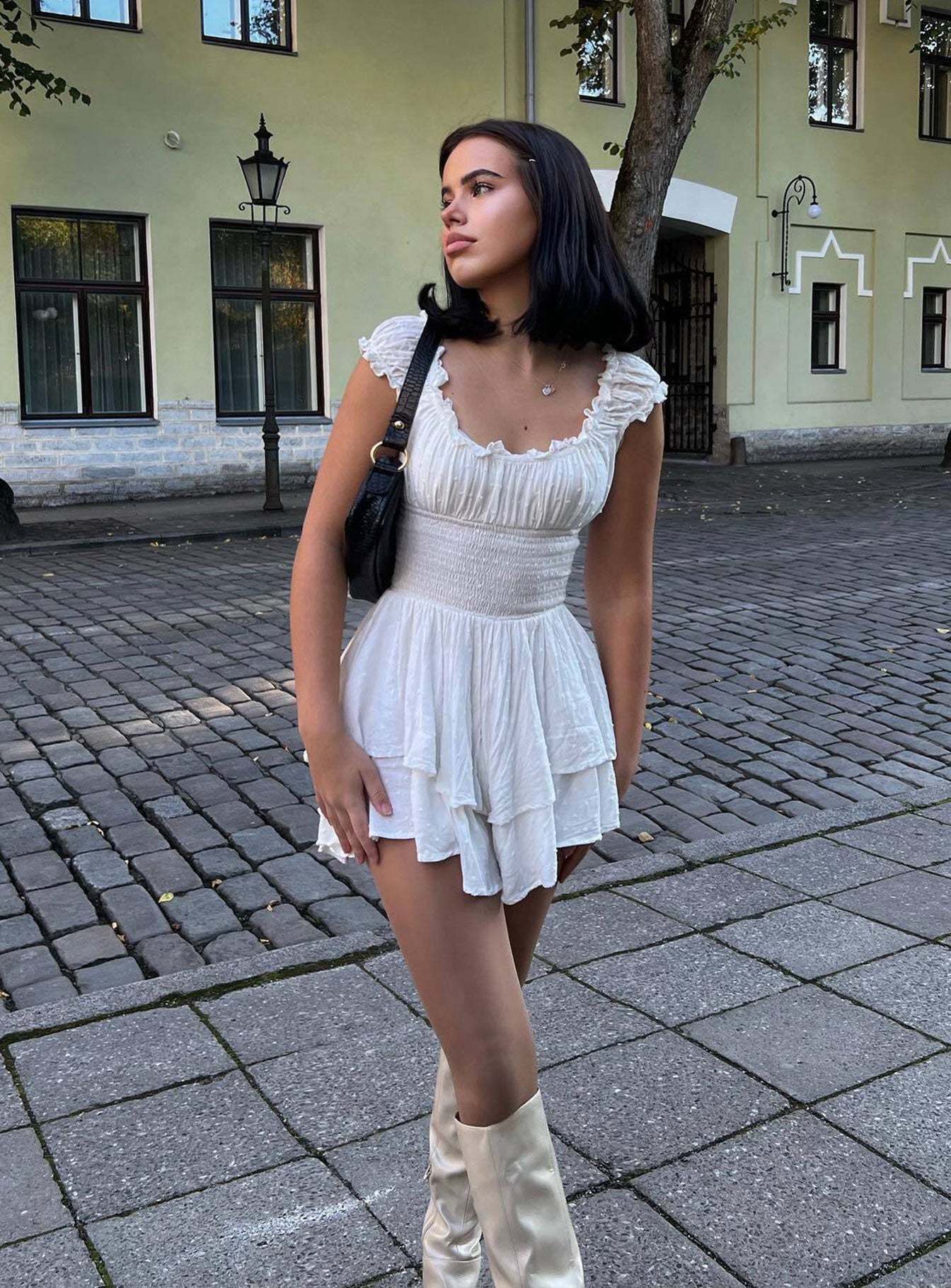 White romper Soft textured material Can be worn on or off the shoulder Shirred waistband Ruffle detailing Elasticated neck and sleeves Good stretch Fully lined