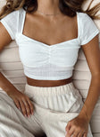 Crop top Soft knit material Sweetheart neckline Cap sleeves Good Stretch Lined bust