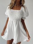 White romper Elasticated shoulders Puff sleeves  Shirred bust Double back tie fastening  Low back 