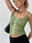 Green top Lace material Square neckline Hook and eye fastening at front Good stretch Mesh lining