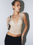 Crop top Lace material  Plunging neckline