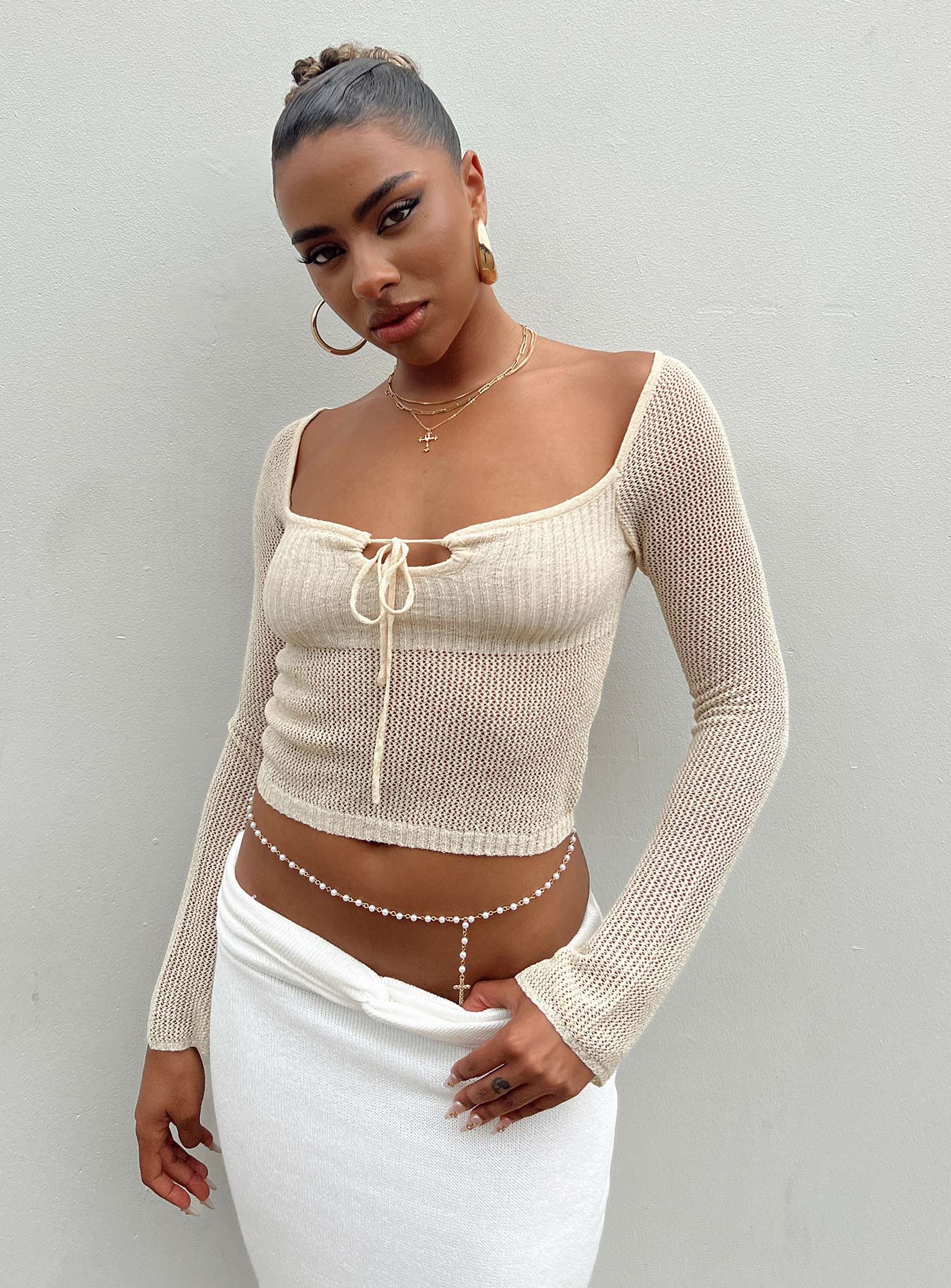 Front view of model wearing  front Princess Polly Full Sleeves Boat Neck  Tyren Top Bone