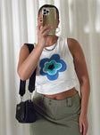 Front view of model wearing  front Princess Polly Sleeveless Crew Neck  Aspects Flower Tank White