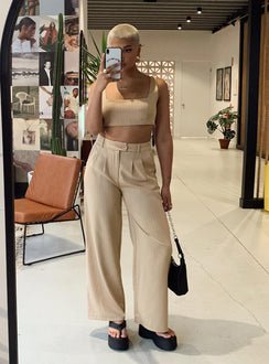 Matching set Pinstripe print  Crop top Invisible zip fastening at side High waisted pants Wide leg Belt loops at waist Zip & button fastening Lined top
