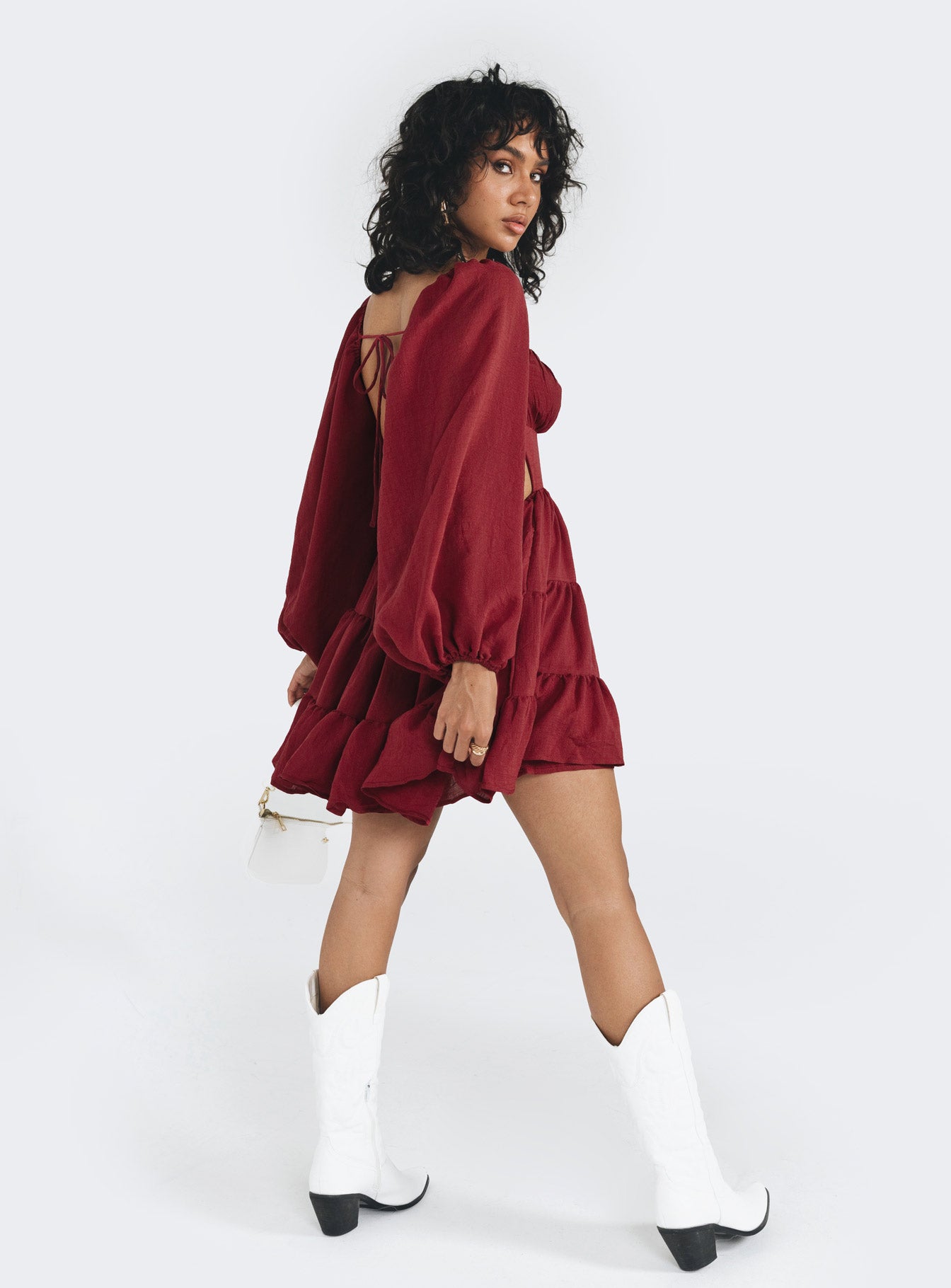 Front view of model wearing  front Princess Polly Crew Neck  Danny Long Sleeve Mini Dress Burgundy