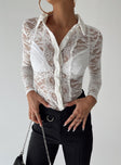Long sleeve top Sheer lace material  Delicate material - wear with care Classic collar  Button front fastening 