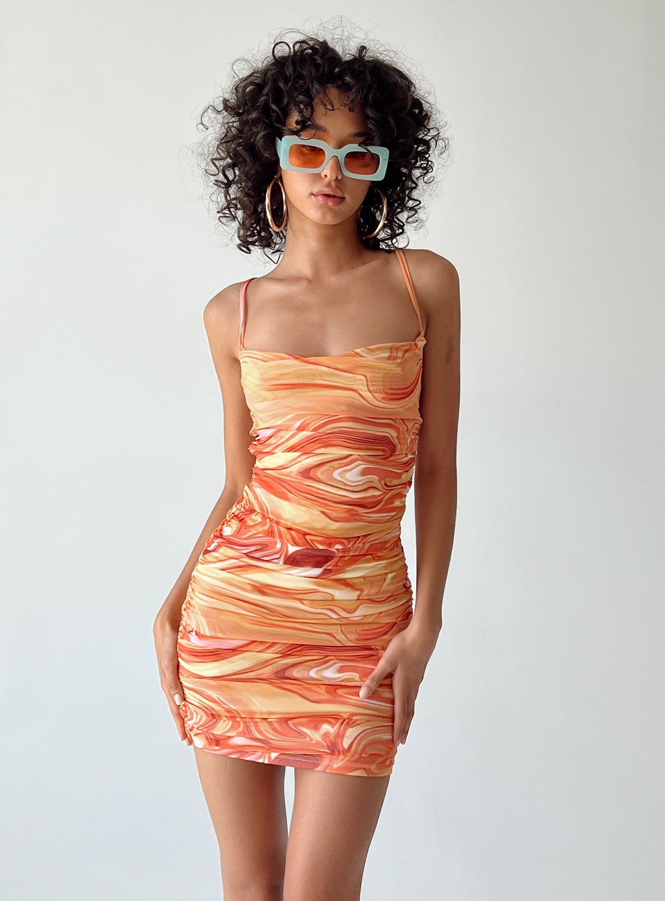 front view of model wearing Princess Polly Harlan Mini Dress Orange Multi Cowl Neck 