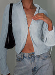 Front view of model wearing  front Princess Polly Full Sleeves Plunger  Aluna Shirt Blue