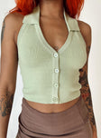 Crop top Soft knit material  Fixed halter neck  Classic collar  Button front fastening